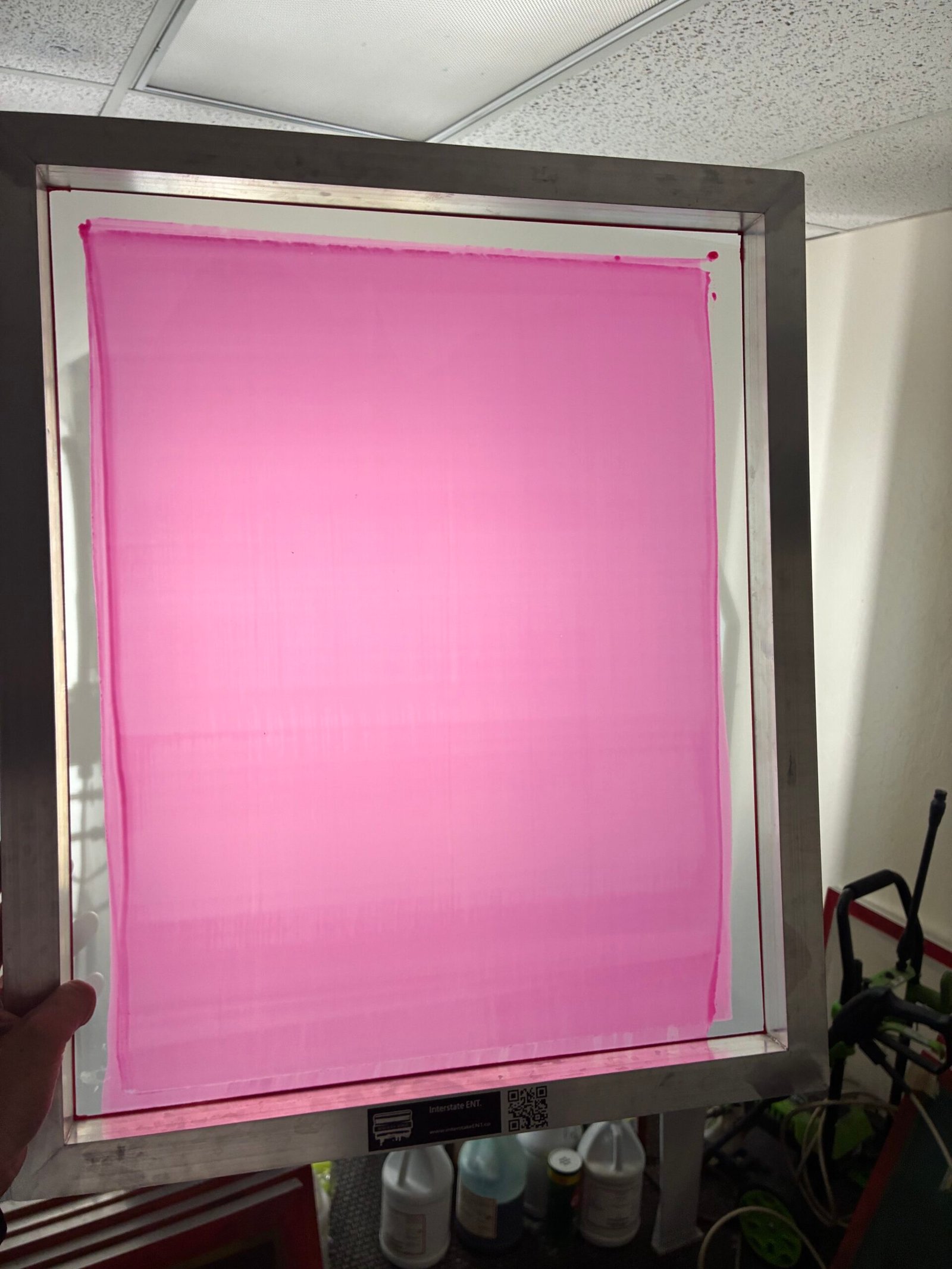 Silkscreen coated with a pink emulsion, no image burned on it yet